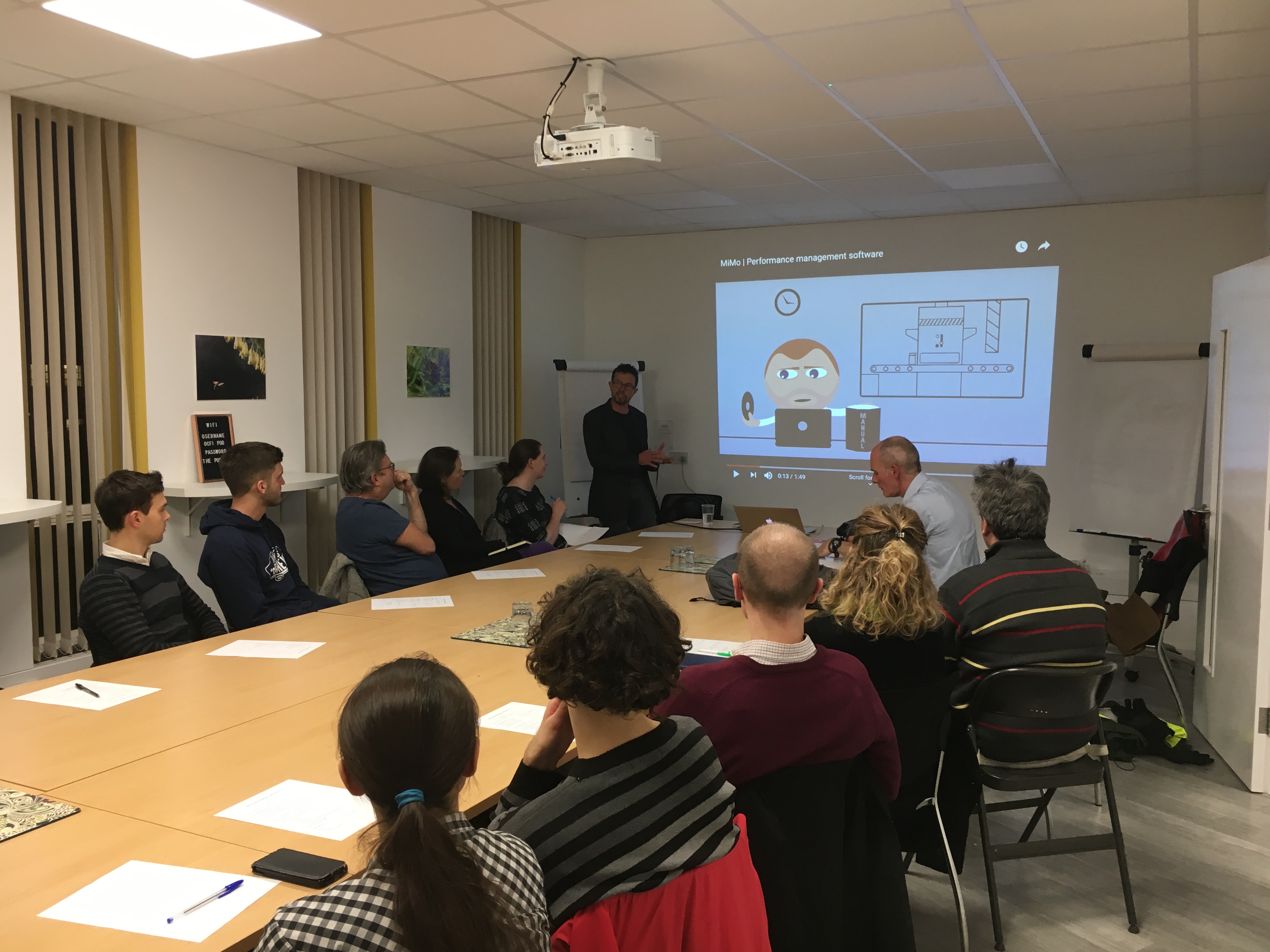 Oxford Inventors Meetup audience man presenting to a room of people around a boardroom table